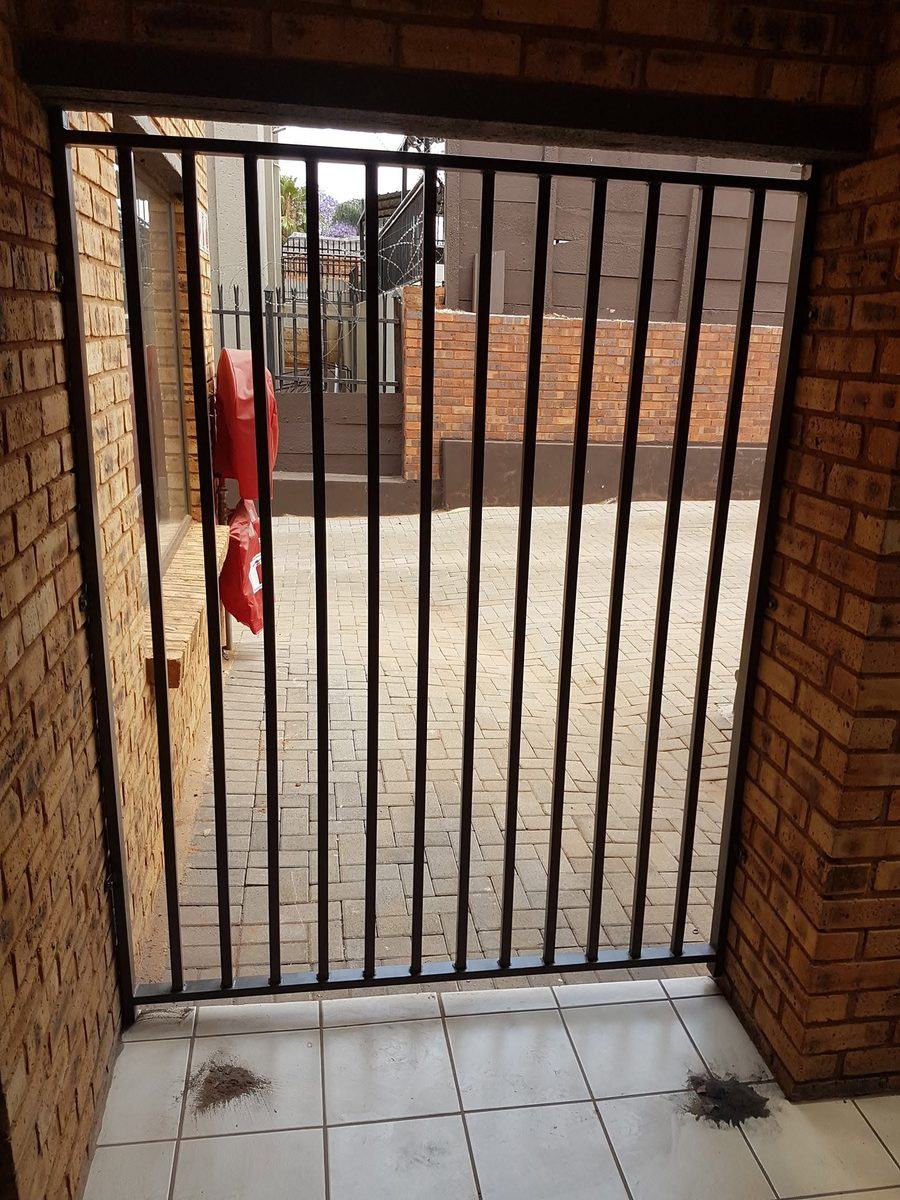 Black steel security gate at a home entrance in Pretoria