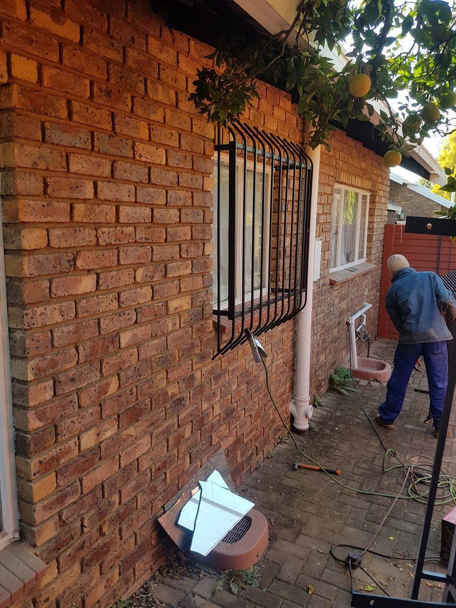 Steel burglar bars fitted to the windows of a Pretoria home