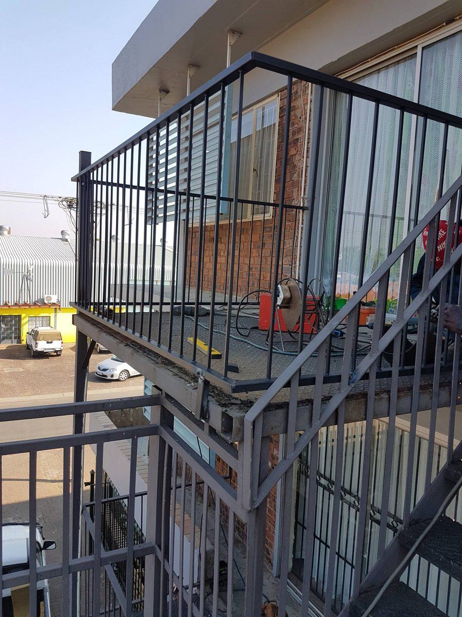 Steel security bars enclosing a patio balcony in Pretoria